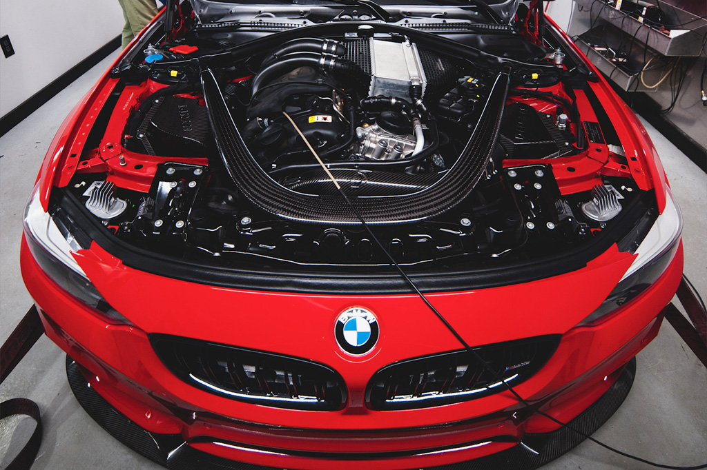 Under the bonnet of a car being checked over before a dyno session