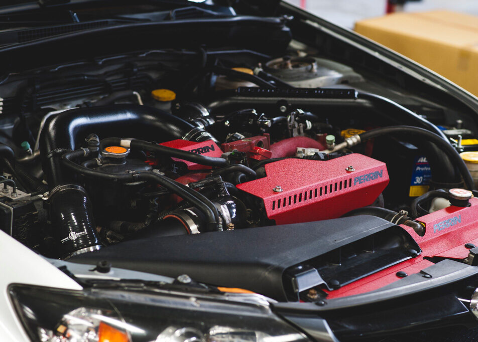 A car being prepared for a dyno session at R/T Tuning