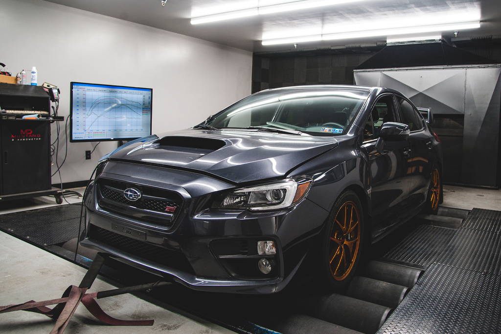 A Subaru STI on the AWD dyno at R/T Tuning
