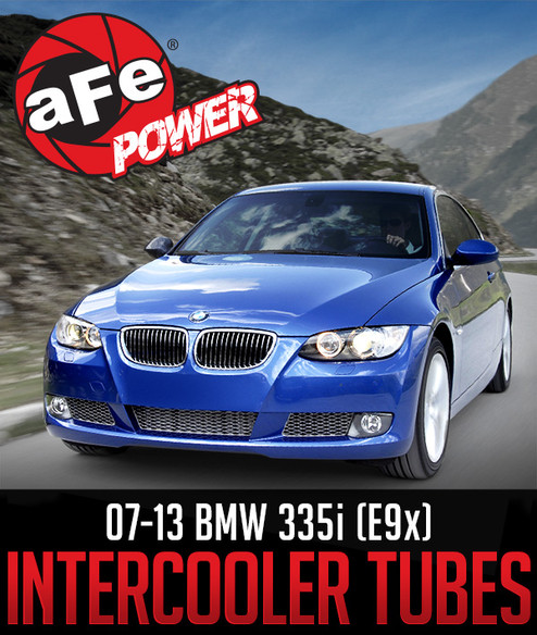 Blue BMW 335i (E9x) driving on a mountain road, aFe Power logo above, text reads "07-13 BMW 335i (E9x) Intercooler Tubes".