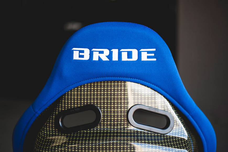 Blue Bride Stradia II seat with carbon fiber backrest detail in Subaru STi.